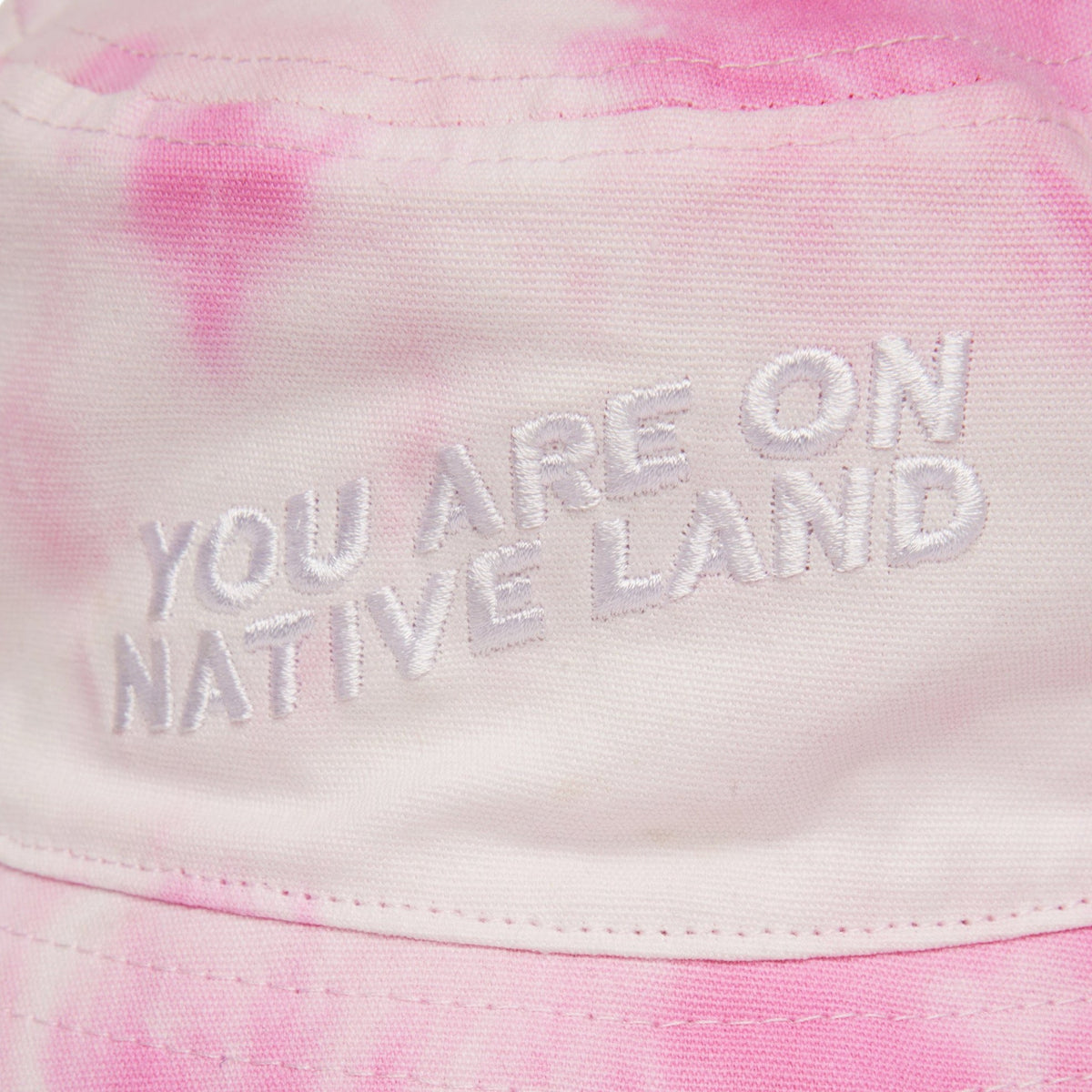 'YOU ARE ON NATIVE LAND' BUCKET HAT