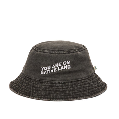 'YOU ARE ON NATIVE LAND' BUCKET HAT