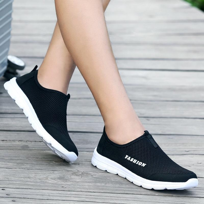 Short Product Title: Men’s Ultra-Lightweight Mesh Running Shoes